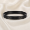 Gemini_Generated_Image_v3o6xav3o6xav3o6 Black Screw Detail Minimalist Oval Bangle